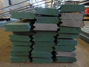 lot 80 image: Large Lot of Extra Long Car Siding Green Wood for Porches  Decks